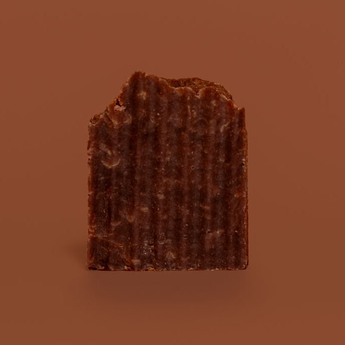 Brown textured block on a brown background