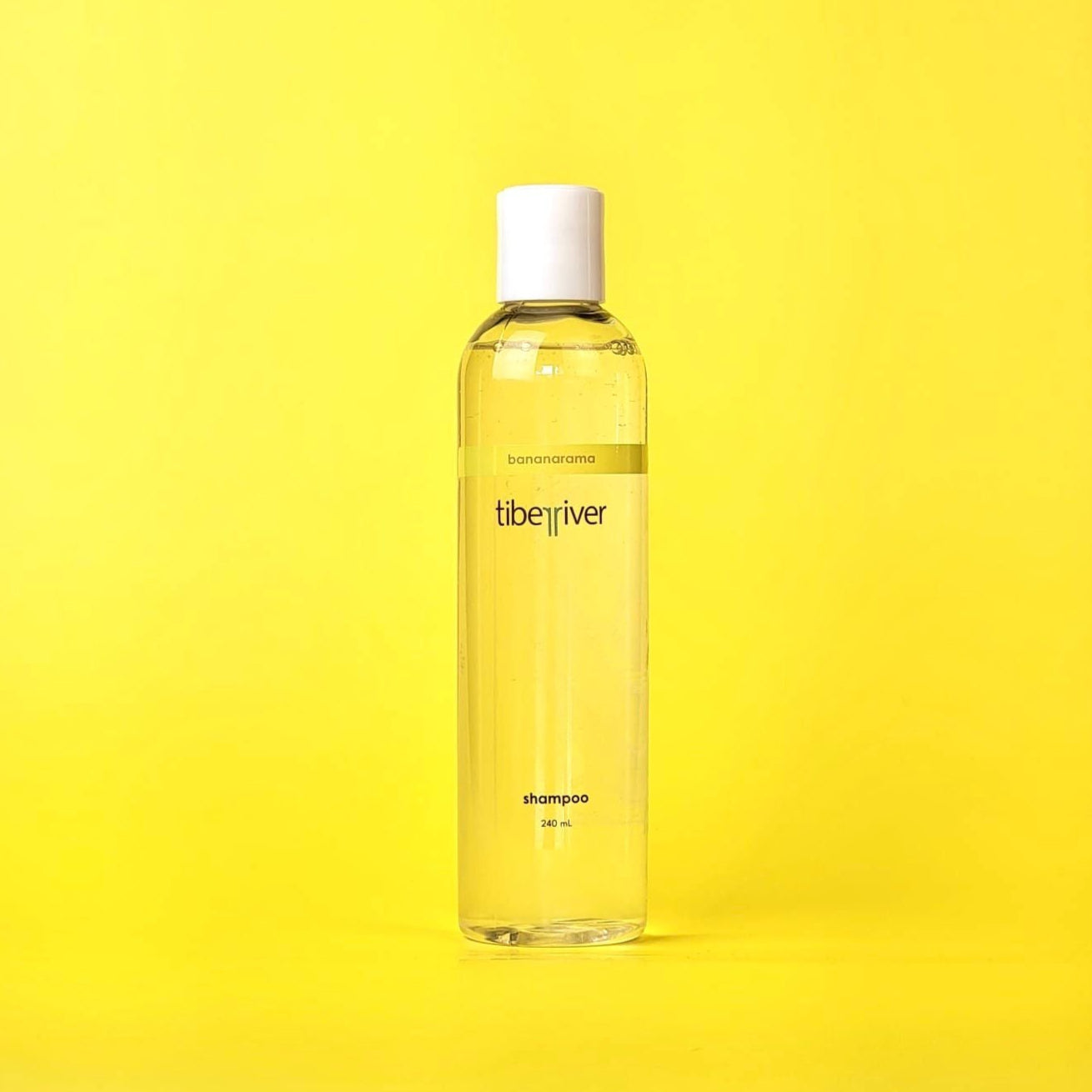 Bottle of LibeRiVe on a yellow background